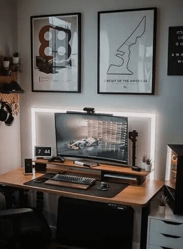 F1 posters hanged on top of a home office desk setup. Car enthusiast posters for home decoration.