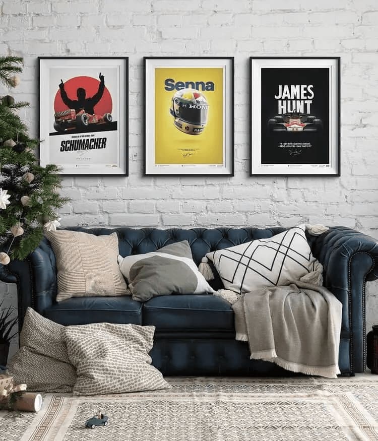F1 posters christmas gifts on top of a cauch on christams day. Poster gifts from Senna and Vintage Formula 1.