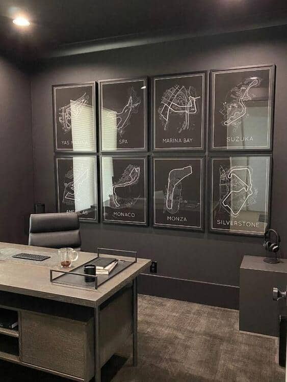 Magnificent dark office wall decoration with 6 posters of race circuit outlines from around the world, white lines over black background.
